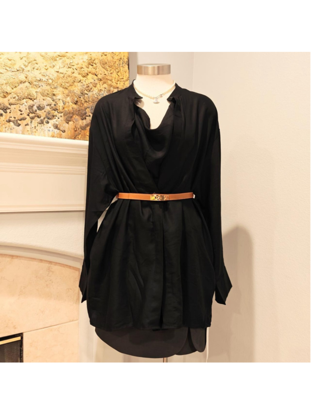 Minimalist black designer-inspired shirt in a relaxed, draped silhouette
